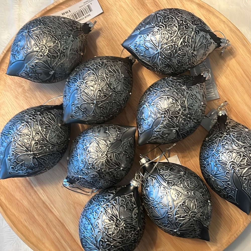 Nine Glass metallic onion ornaments. Unused; 2 still have tags.